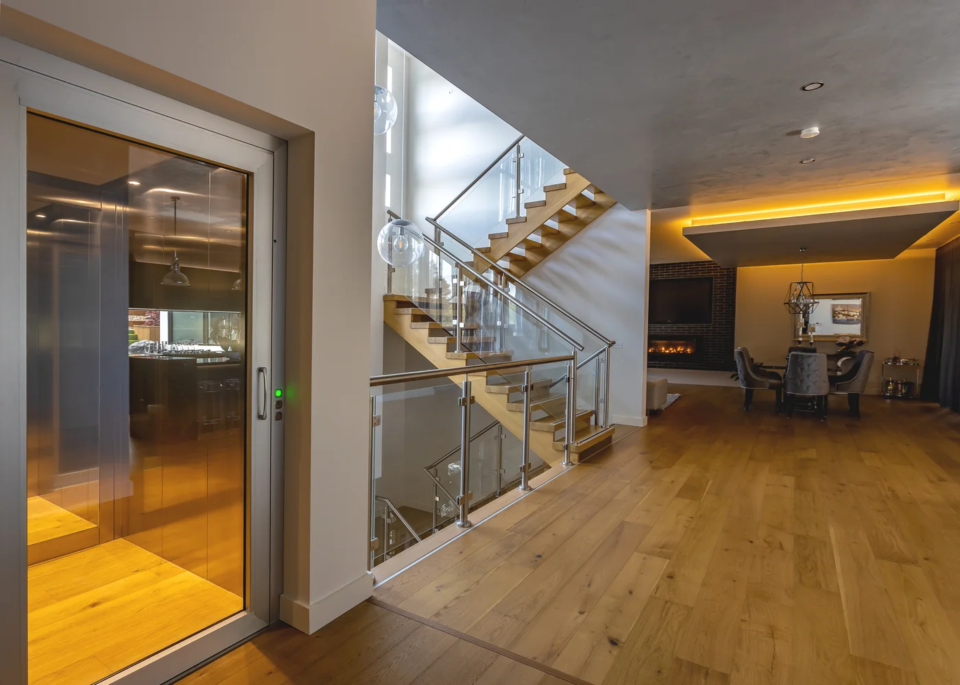 Feature stairwell with glass balustrade, natural light and carefully coordinated interior detailing.